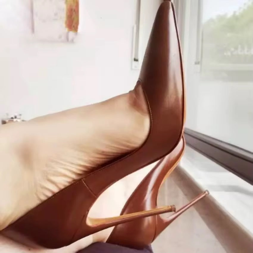 Gold bottom nude pump heels