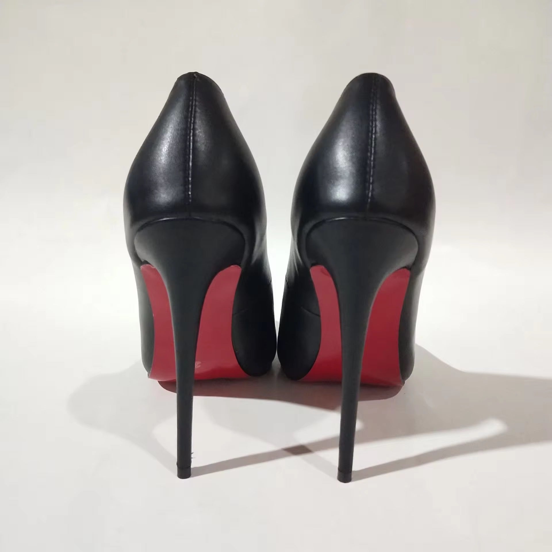 Red buttom pumps